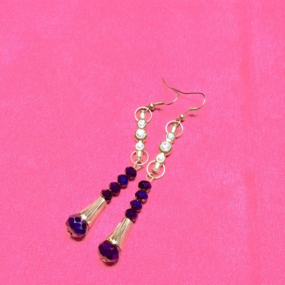 Dangle he earrings purple stones and white stones very pretty nice for s…